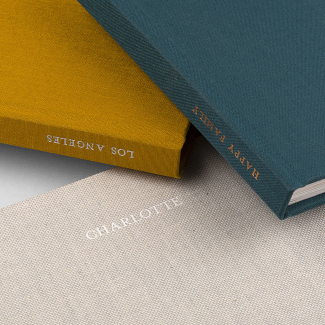 Hardcover Fotobuch mit Stoff und Prägung Hardcover Fotobuch mit Stoff und Prägung